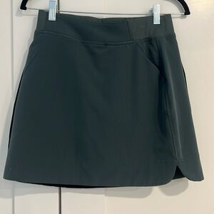 Forest green olive tennis skirt! perfect condition worn once very flattering!